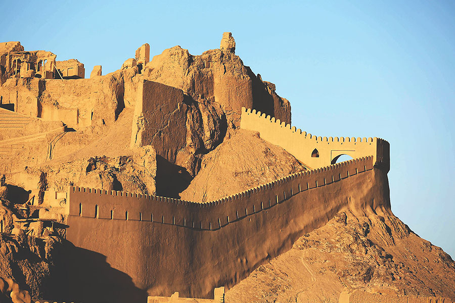 TO GO WITH AFP STORY OF CYRIL JULIEN A general view of the citadel Arg'e Bam, the pre-Islamic desert citadel that was the largest adobe monument in the world made of non-baked clay bricks, is seen on the 10th anniversary of the earthquake in the city of Bam, a thousand kilometres (600 miles) southeast of Tehran, on December 18, 2013. The town Bam was devastated on December 26, 2003, by an earthquake of a magnitude of 6.3 on the Richter scale. Experts who are painstakingly rebuilding the Bam citadel say Iran's architectural masterpiece will never return to its past glory but are hopeful they will restore some of it. AFP PHOTO/ ATTA KENARE