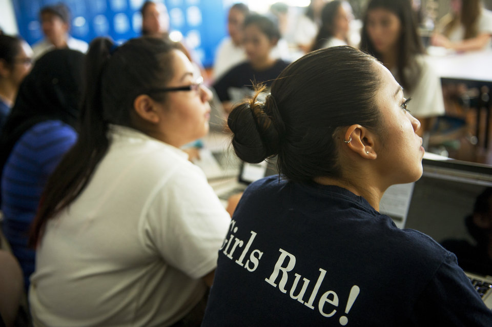 ASTORIA, NY - September 17: Students listen to instructions during a coding class at The Young Women's Leadership School of Astoria on September 17, 2015, in Astoria, New York. The all-girls STEM-focused public school was established in 2006. (Photo by Ann Hermes/The Christian Science Monitor via Getty Images)