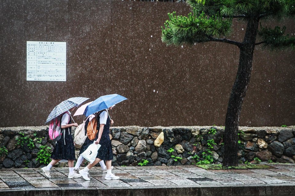 [UNVERIFIED CONTENT] Student girls are going to school under the rain. June 2013, Kyoto, Japan.