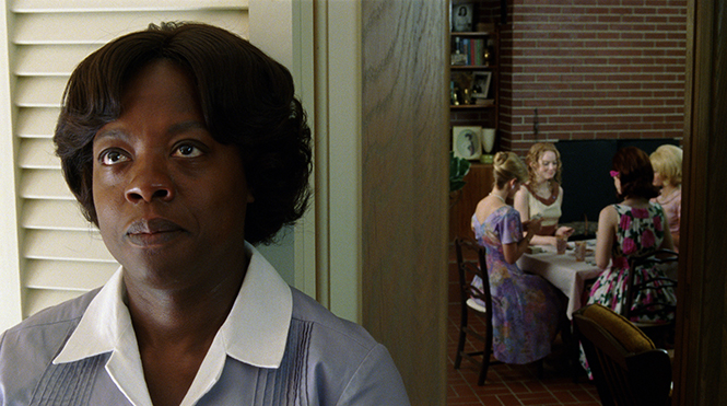 "THE HELP" FF-001 Aibileen Clark (Viola Davis) overhears the exchange between Skeeter Phelan (Emma Stone, center) and her friends in DreamWorks Pictures' drama, "The Help", based on the New York Times best-selling novel by Kathryn Stockett. ©DreamWorks II Distribution Co., LLC. ÊAll Rights Reserved.